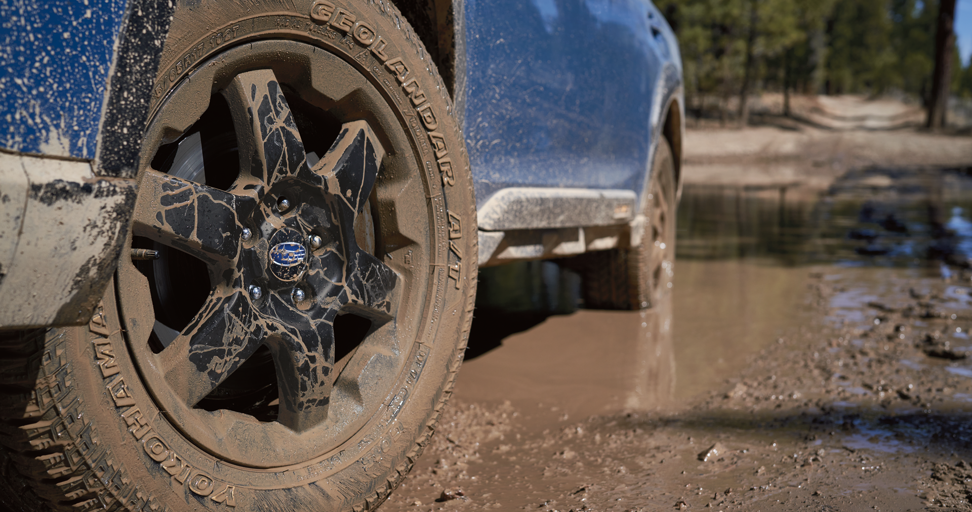 A close-up of the 17-inch off-road wheels and all-terrain Yokohama GEOLANDAR® tires on the 2023 Outback Wilderness. | Wyatt Johnson Subaru in Clarksville TN