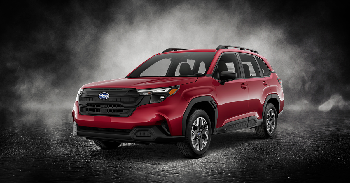 A Subaru Forester on a grunge black background